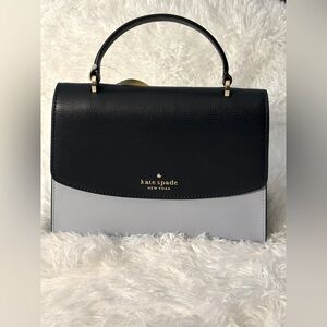 Adorable Kate Spade bag. Navy and light blue. Like new condition.